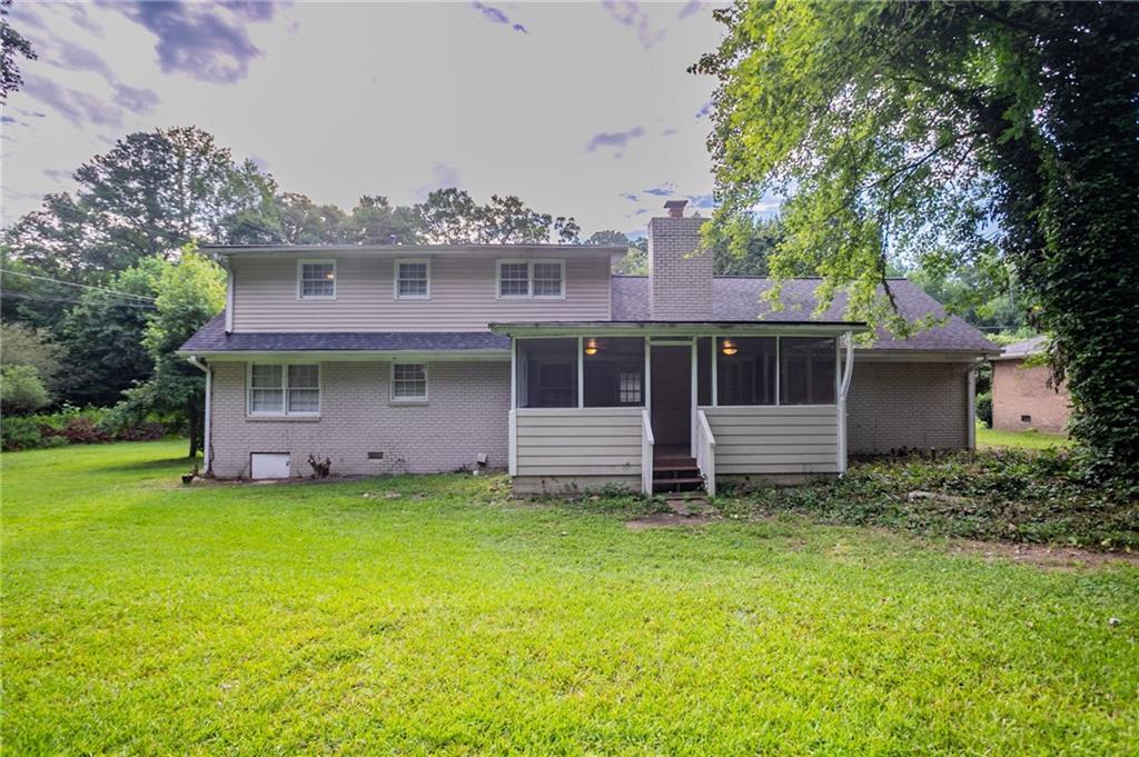 542 Hasty Drive Lithia Springs, GA 30122 - Photo 36 of 44 a view of a house with a yard