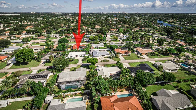 a view of backyard with patio