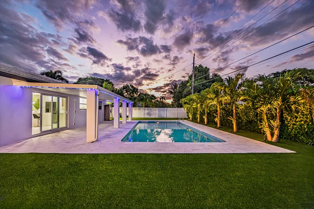 $985,000 | 1881 Caribbean Road West, Lake Clarke Shores, FL 33406