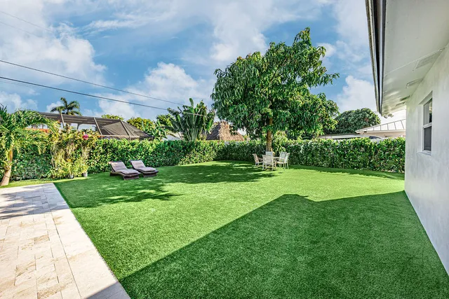 a view of a garden with a fountain