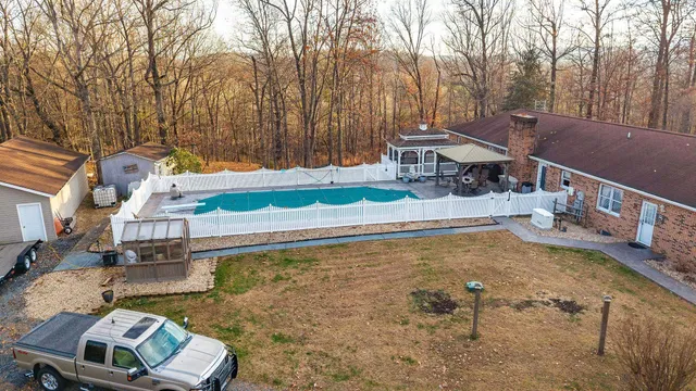 a front view of a house with parking space