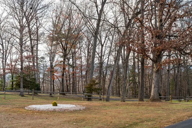 a kitchen with stainless steel appliances and cabinets