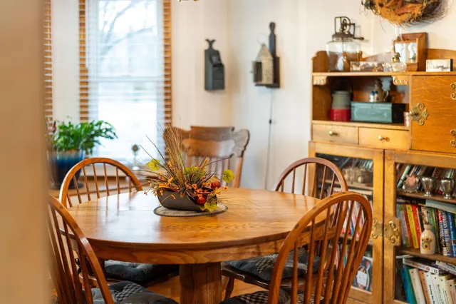 a bathroom with a sink mirror and vanity