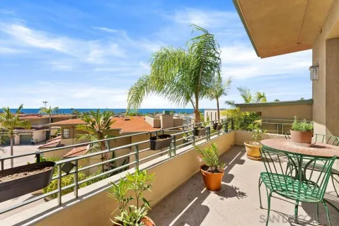 a view of a chairs and table on the terrace