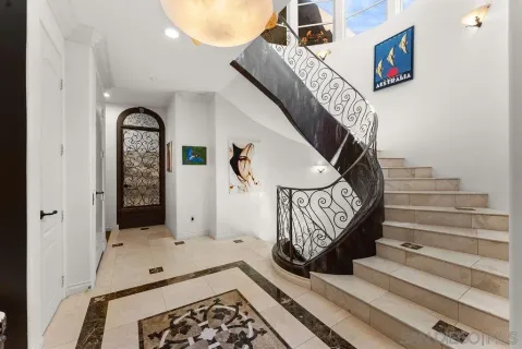 a view of entryway with a front door
