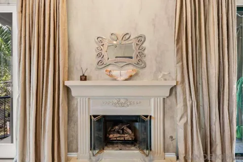a white building with a fireplace