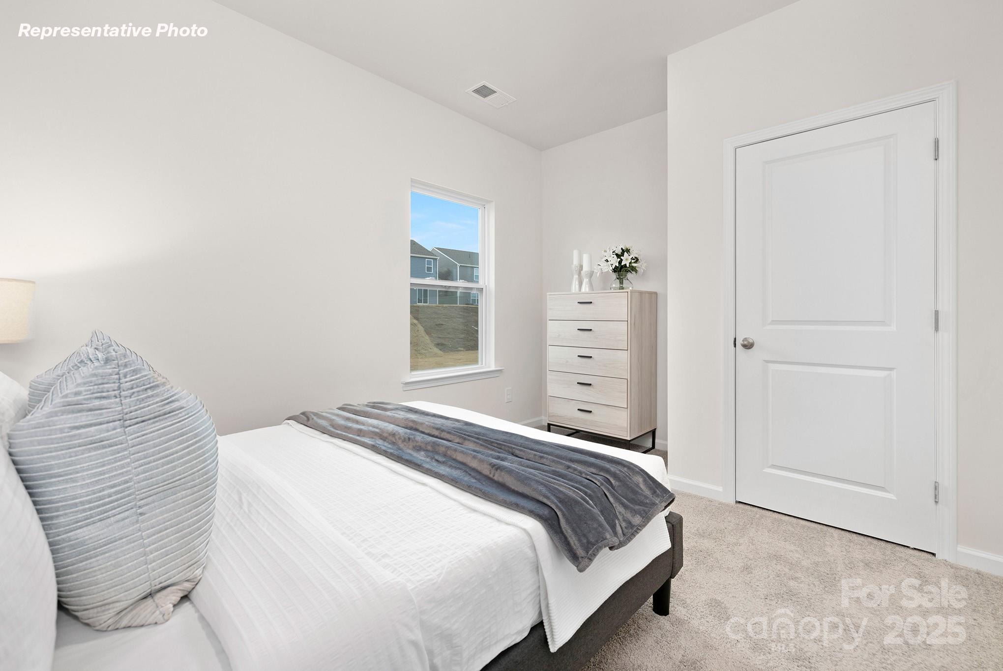 2693 Goose Fair Road Maiden, NC 28650 - Photo 11 of 29 a bedroom with a bed and a window