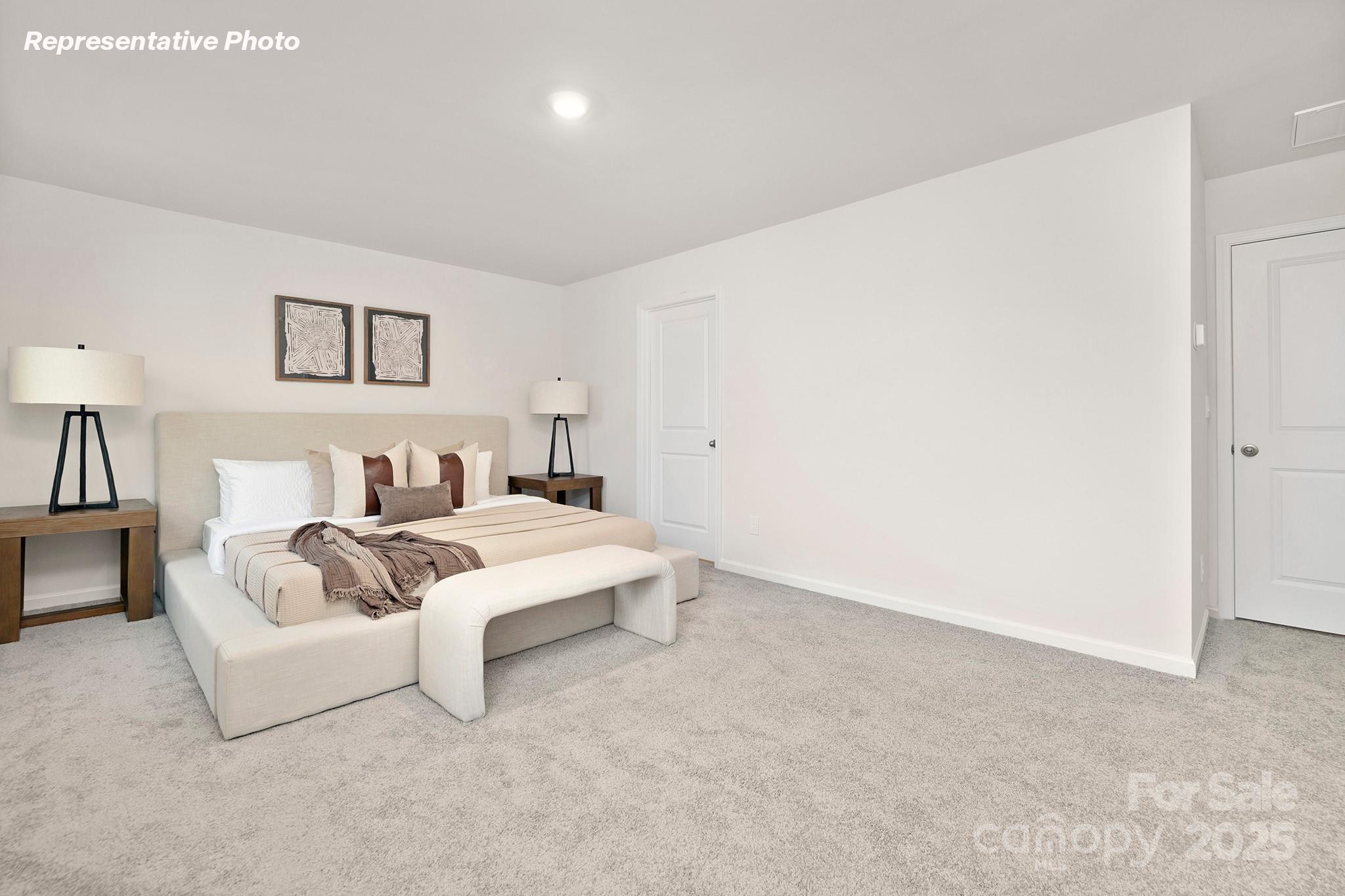 2693 Goose Fair Road Maiden, NC 28650 - Photo 13 of 29 a white and white bed in a room