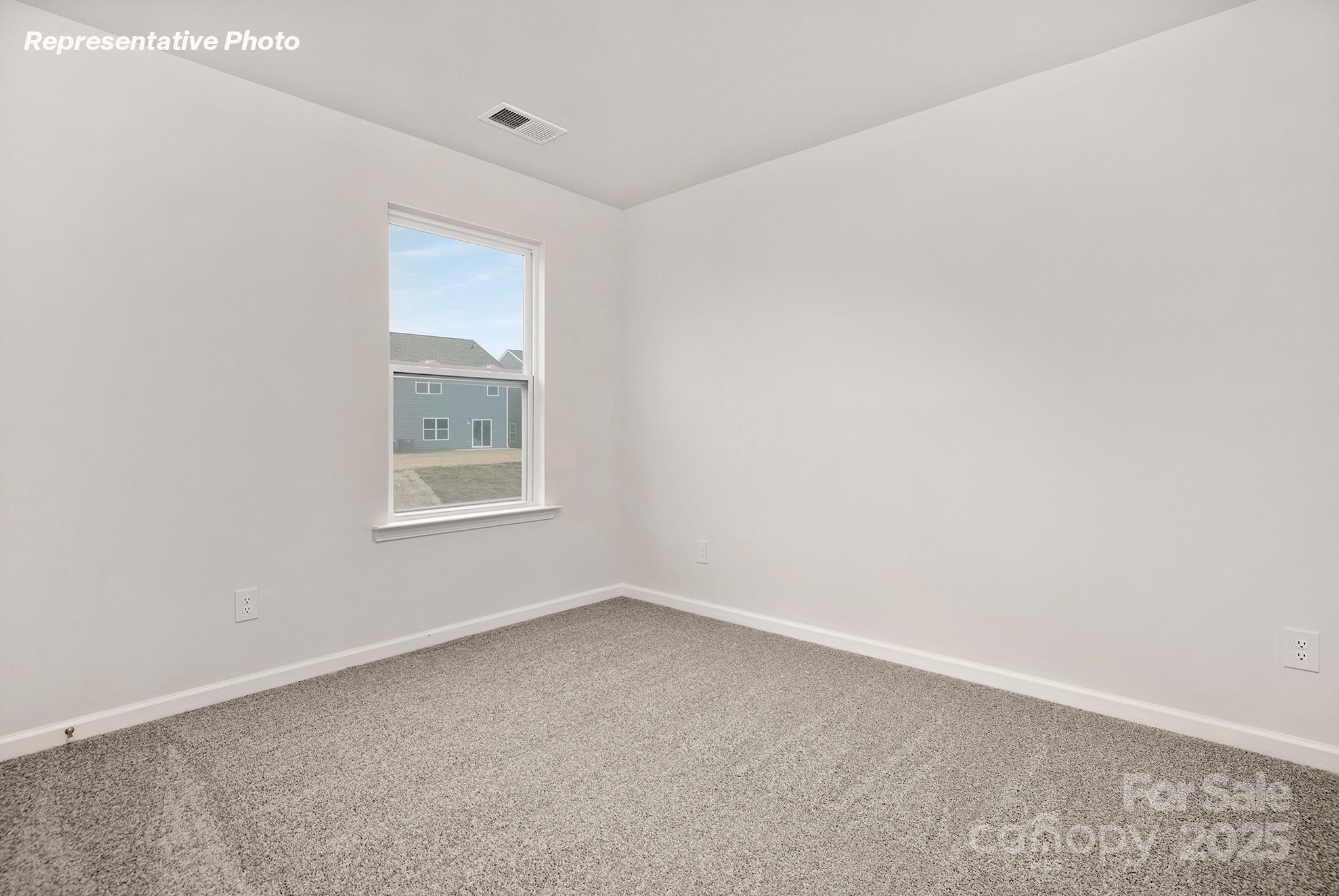 2693 Goose Fair Road Maiden, NC 28650 - Photo 21 of 29 an empty room with a window