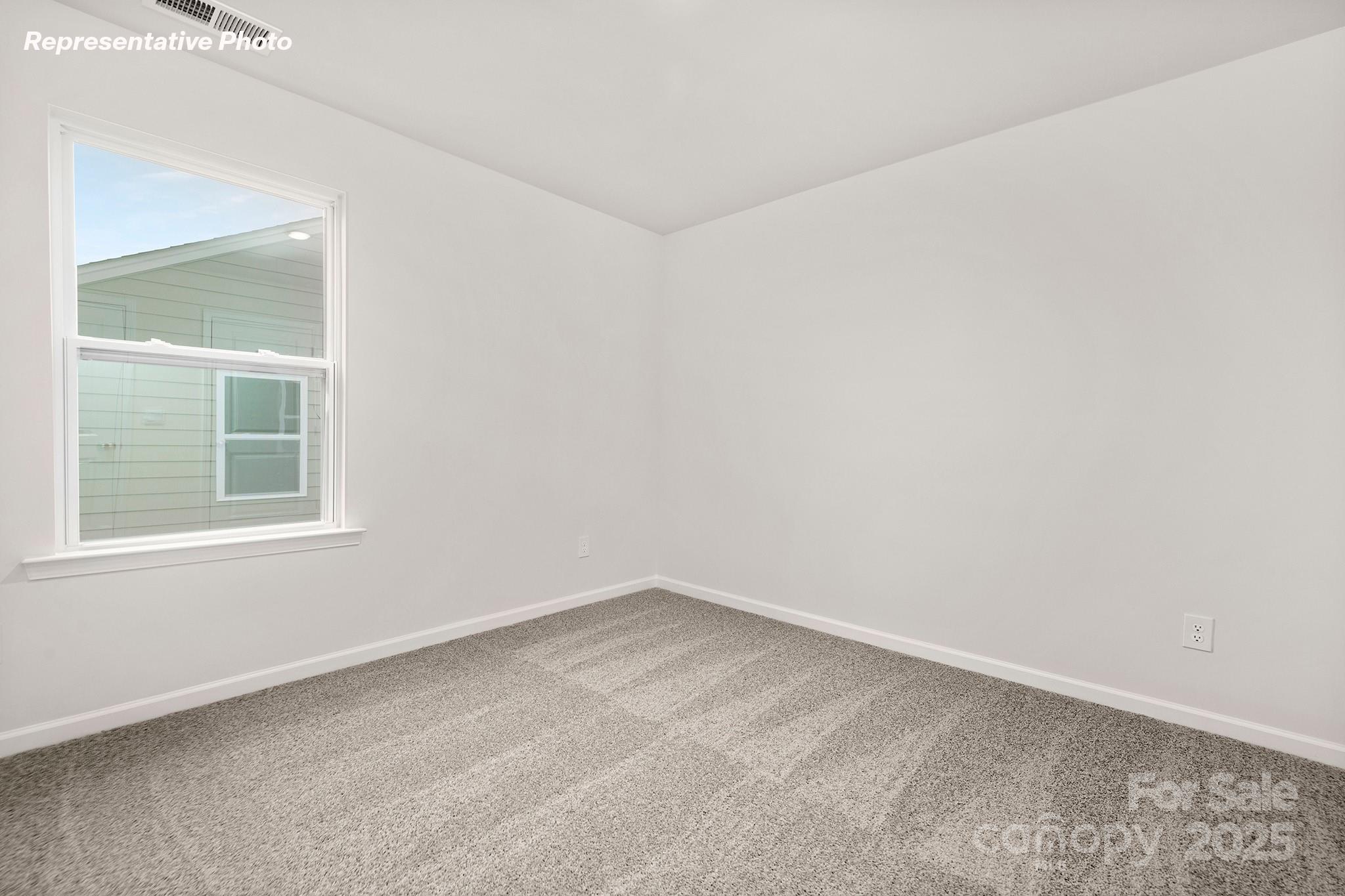 2693 Goose Fair Road Maiden, NC 28650 - Photo 23 of 29 an empty room with a window