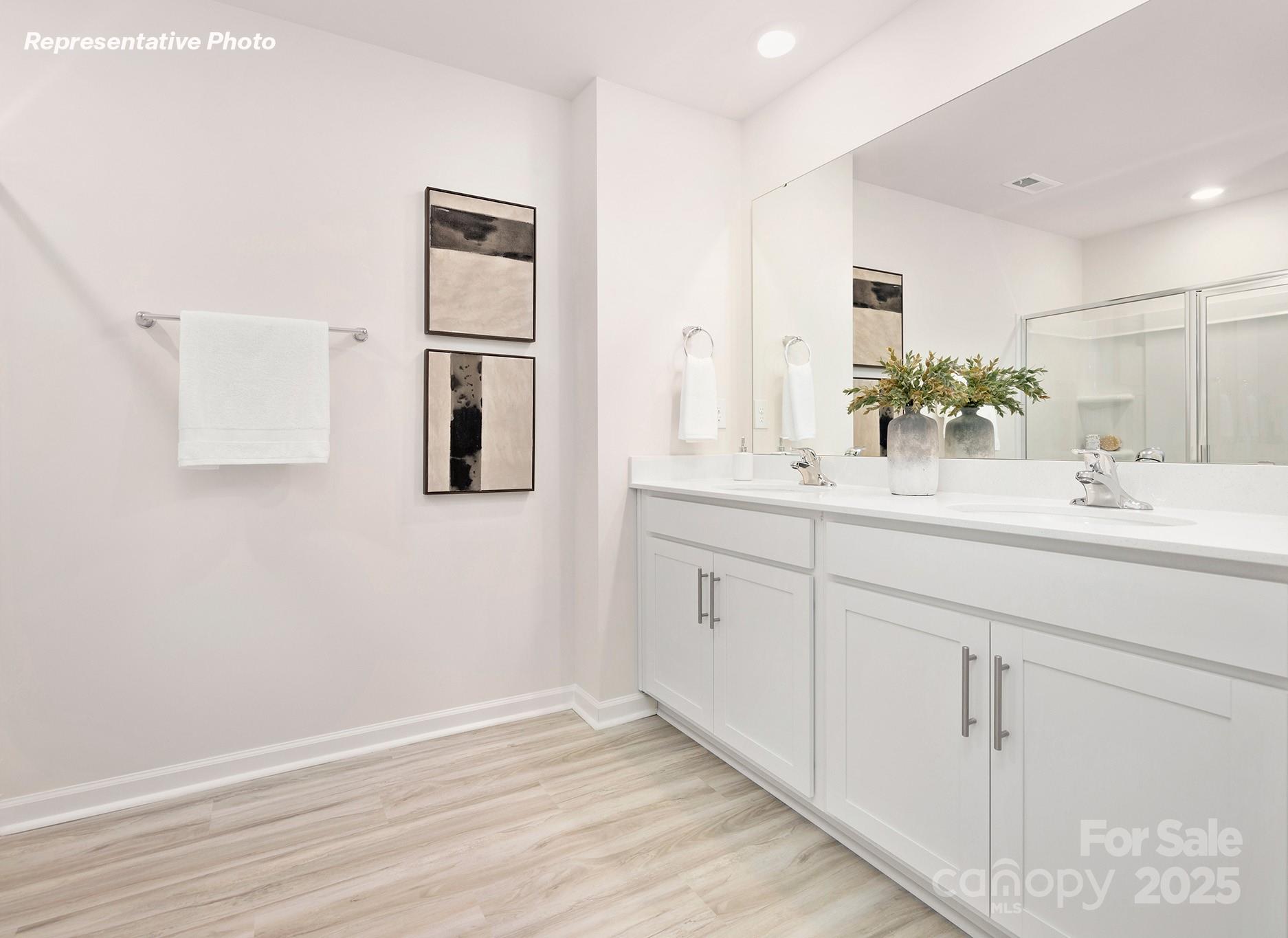 2693 Goose Fair Road Maiden, NC 28650 - Photo 27 of 29 a bathroom with a sink and a mirror
