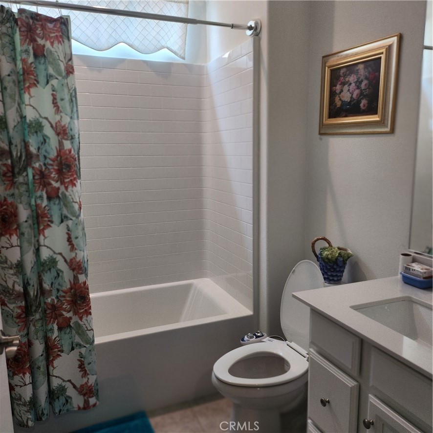11882 Wandering Way Corona, CA 92883 - Photo 17 of 38 a bathroom with a sink toilet and shower