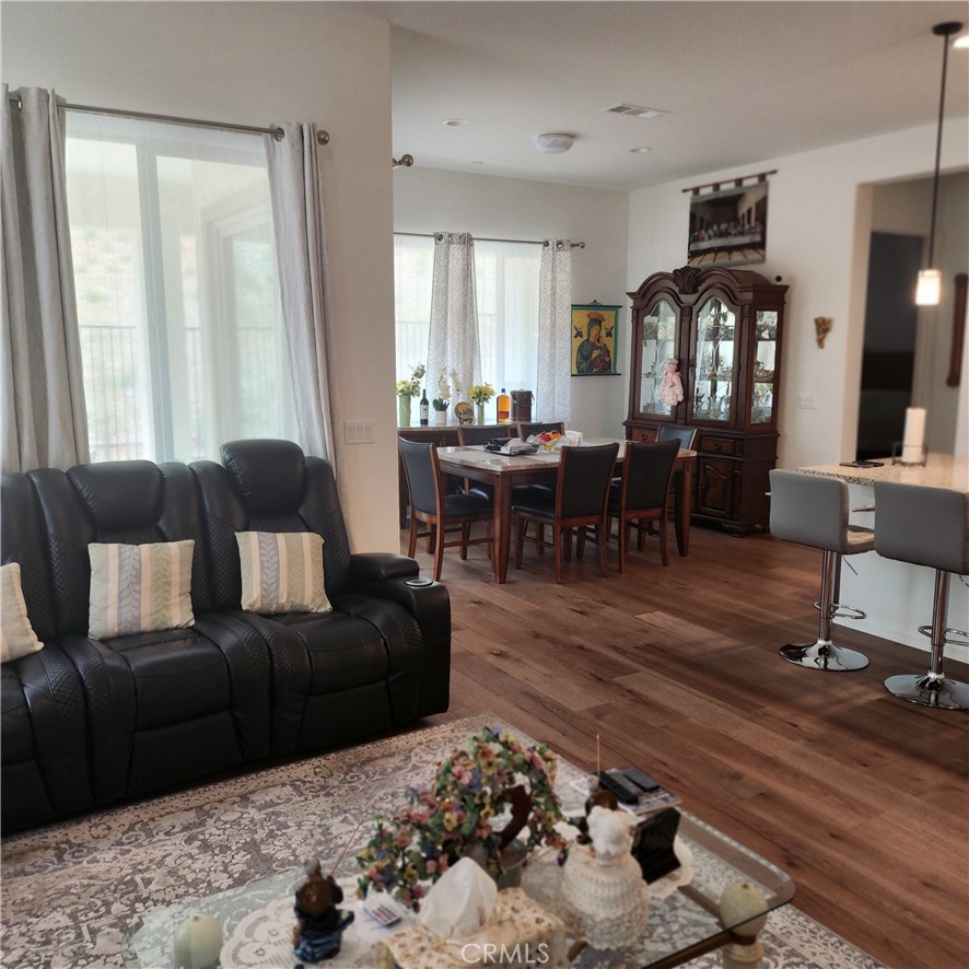 11882 Wandering Way Corona, CA 92883 - Photo 6 of 38 a living room with furniture window and wooden floor