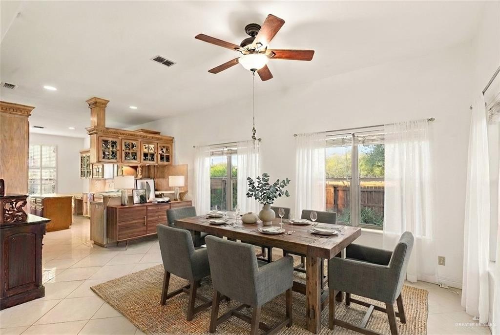 912 North Bentsen Road McAllen, TX 78501 - Photo 17 of 45 a view of a dining room with furniture