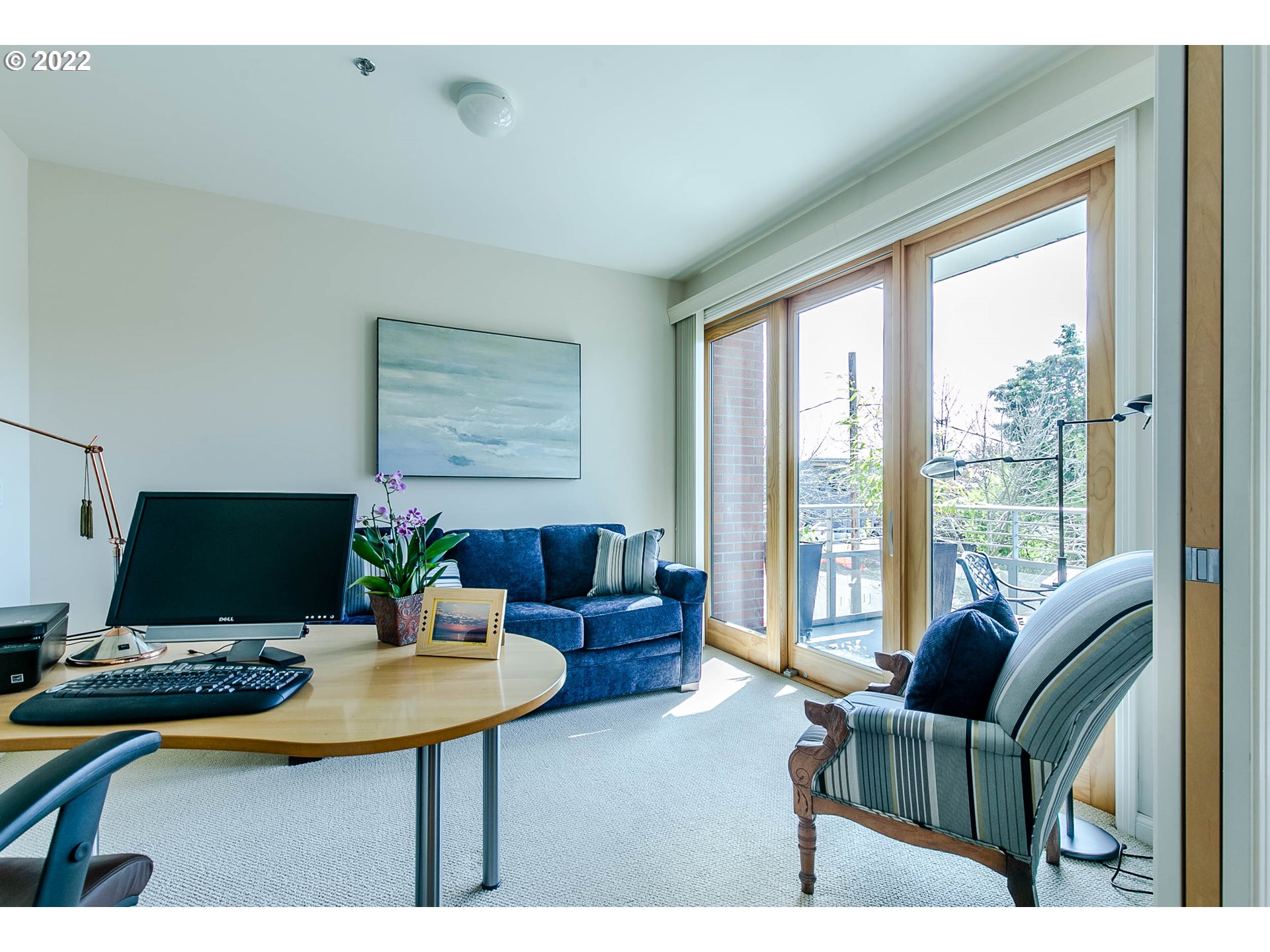 1375 Olive Street, Unit 201 Eugene, OR 97401 - Photo 15 of 32 a living room with furniture and a large window