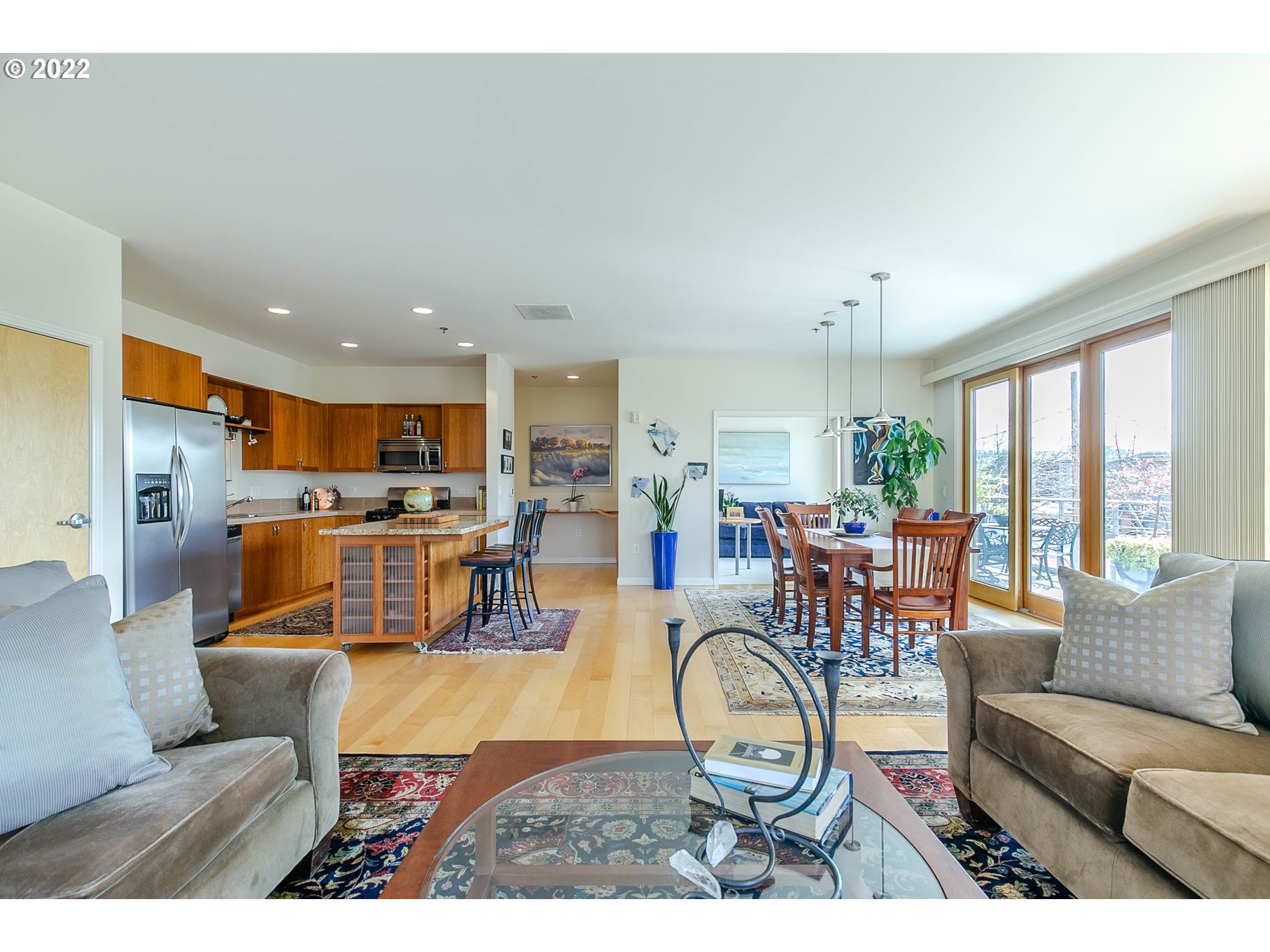 1375 Olive Street, Unit 201 Eugene, OR 97401 - Photo 19 of 32 a living room with furniture and a table