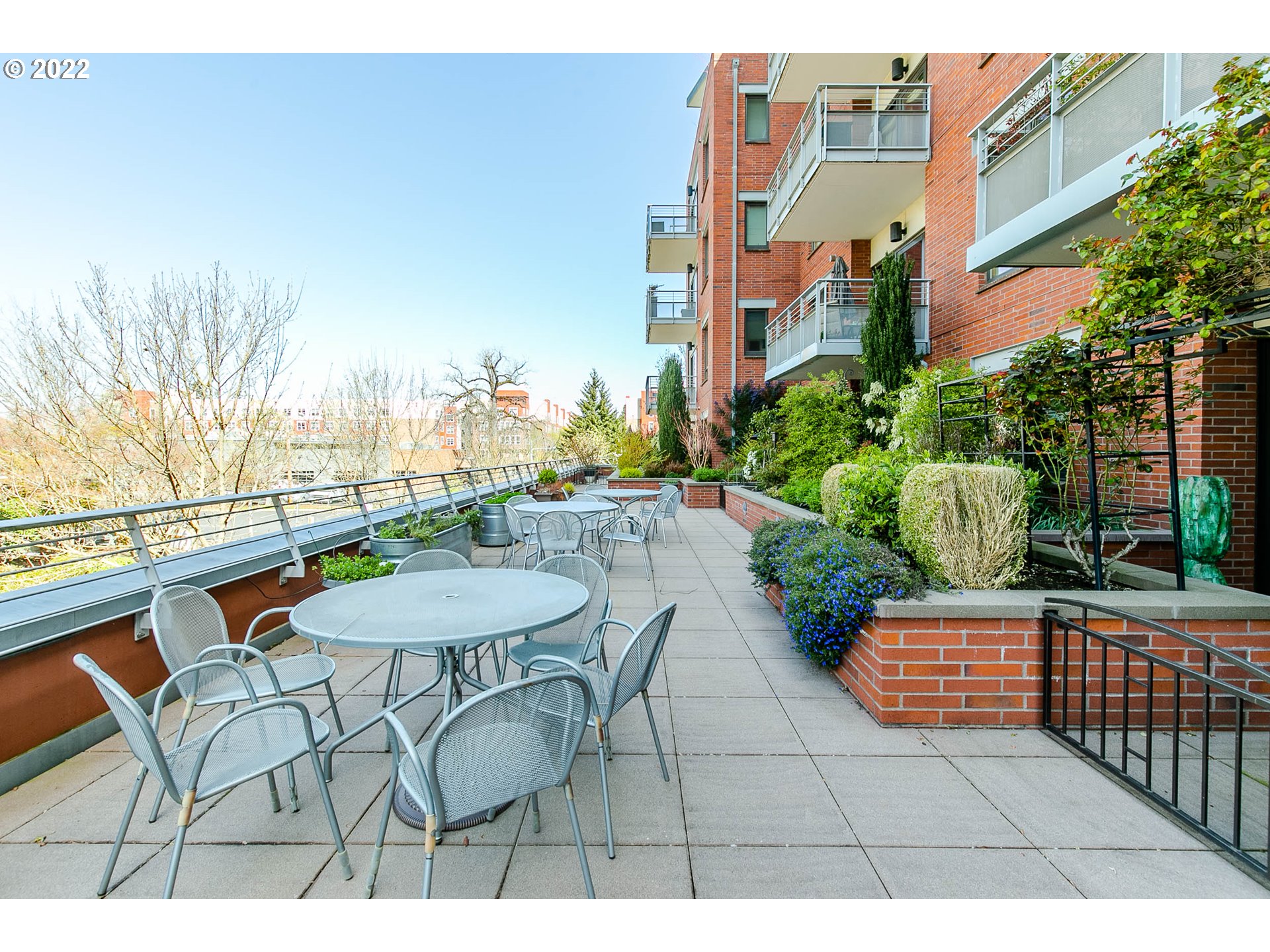 1375 Olive Street, Unit 201 Eugene, OR 97401 - Photo 29 of 32 a view of a chairs and table in the patio