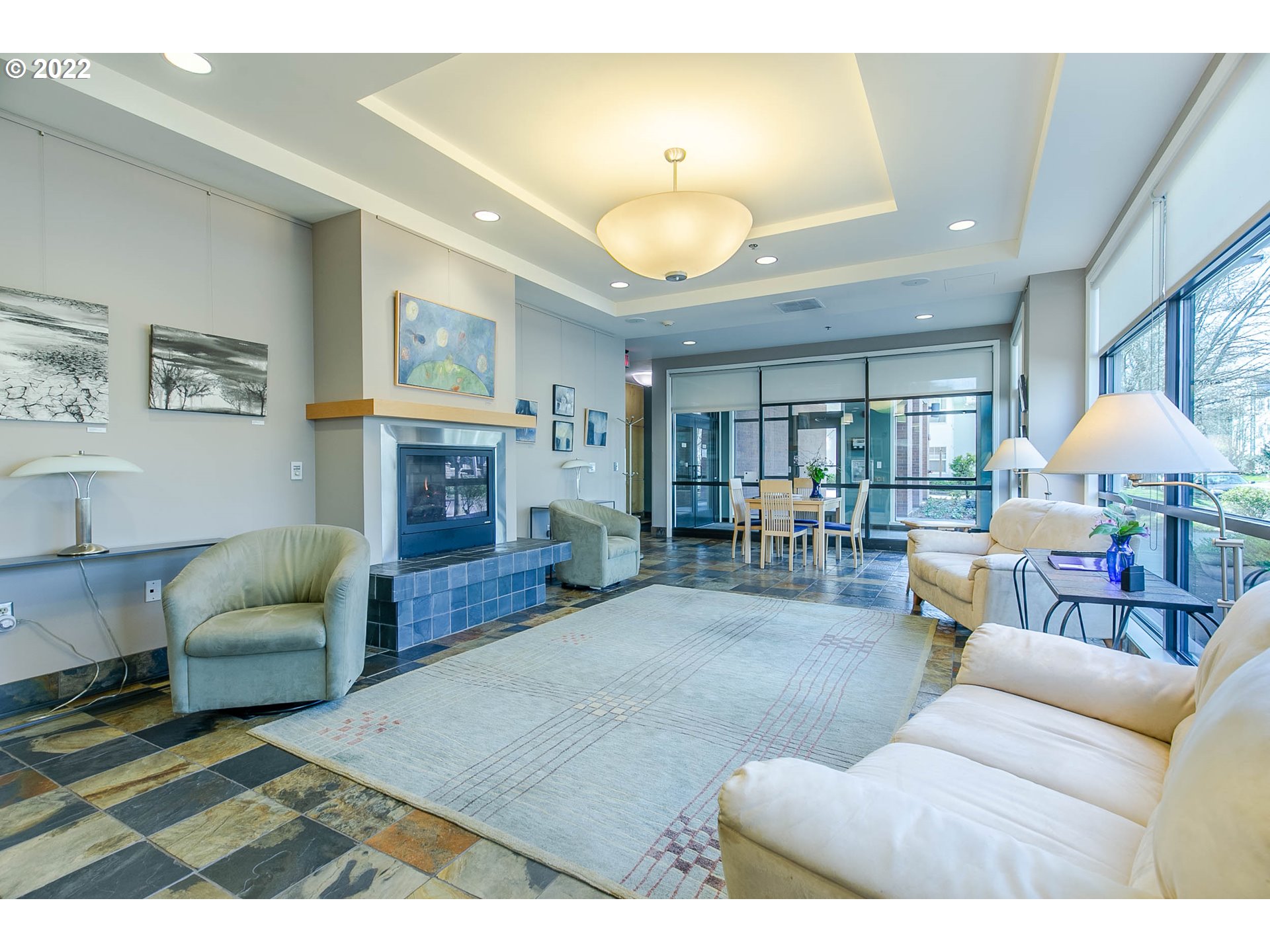1375 Olive Street, Unit 201 Eugene, OR 97401 - Photo 32 of 32 a living room with furniture and a fireplace