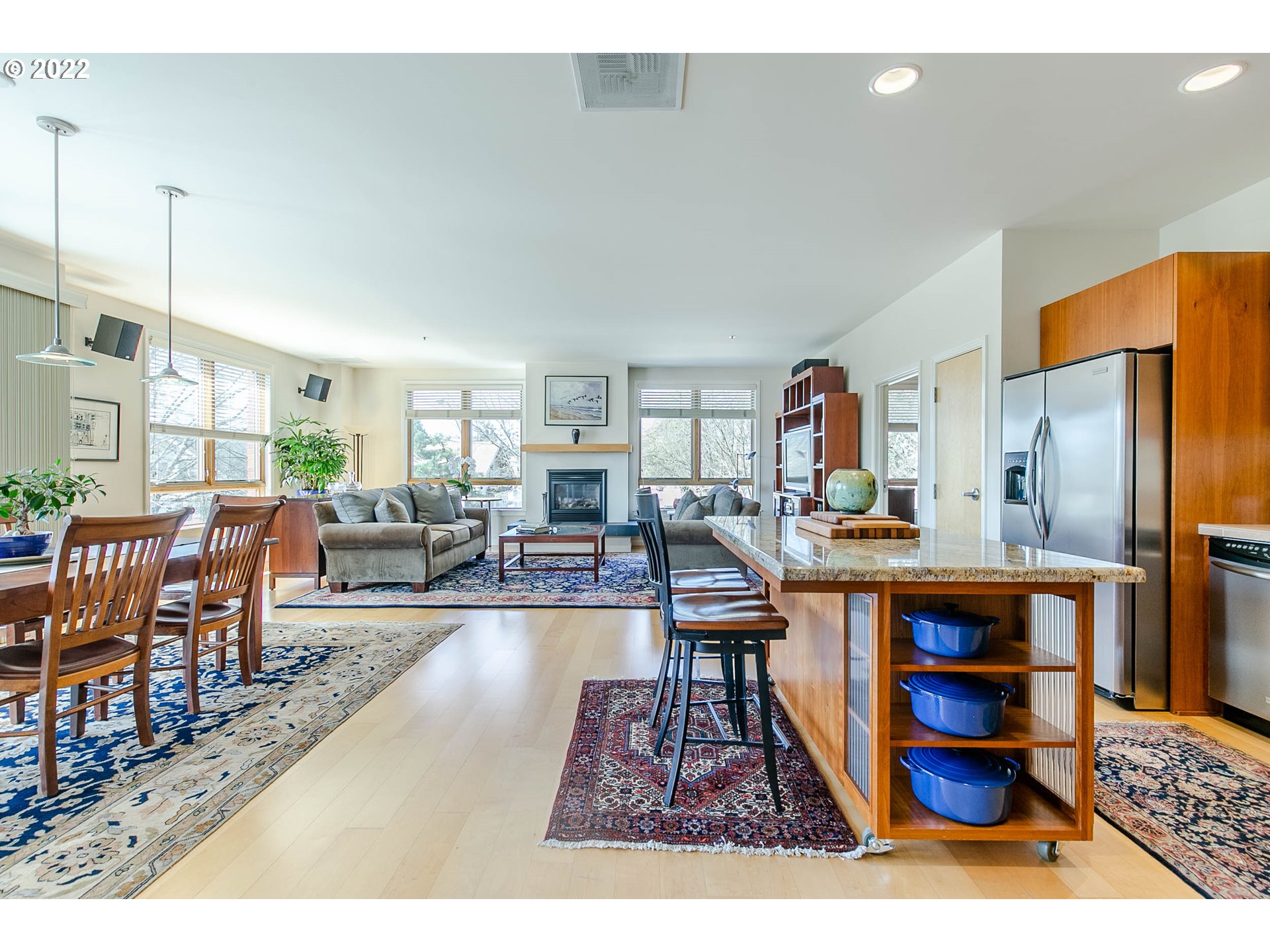 1375 Olive Street, Unit 201 Eugene, OR 97401 - Photo 4 of 32 a living room with lots of furniture and a table