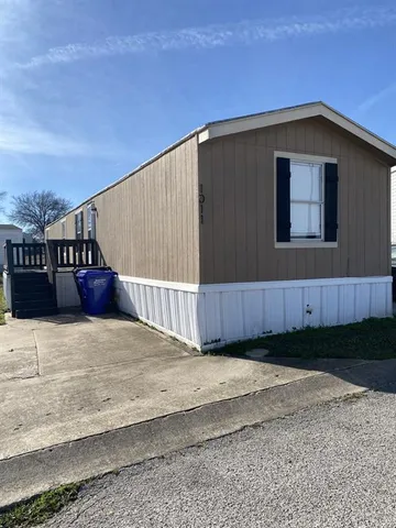 a black white house with a outdoor space
