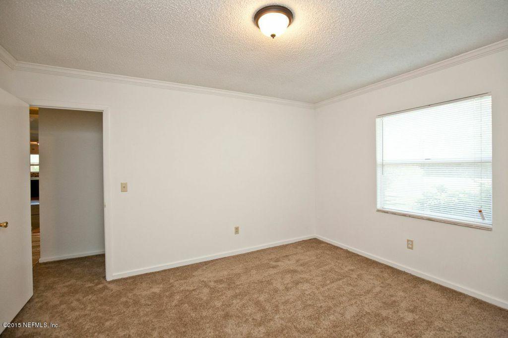 1975 Deer Run Road St. Augustine, FL 32084 - Photo 29 of 35 an empty room with a window