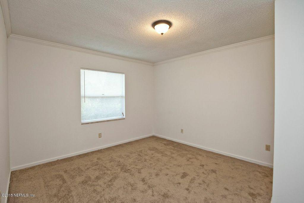 1975 Deer Run Road St. Augustine, FL 32084 - Photo 35 of 35 an empty room with a window