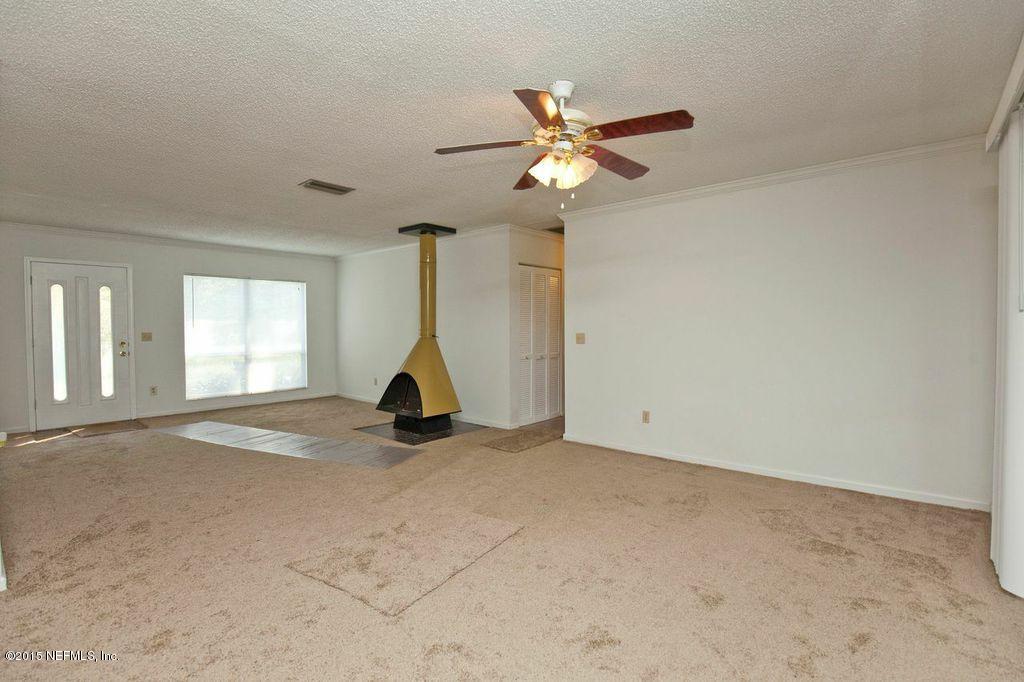 1975 Deer Run Road St. Augustine, FL 32084 - Photo 7 of 35 a view of a room with window and ceiling fan