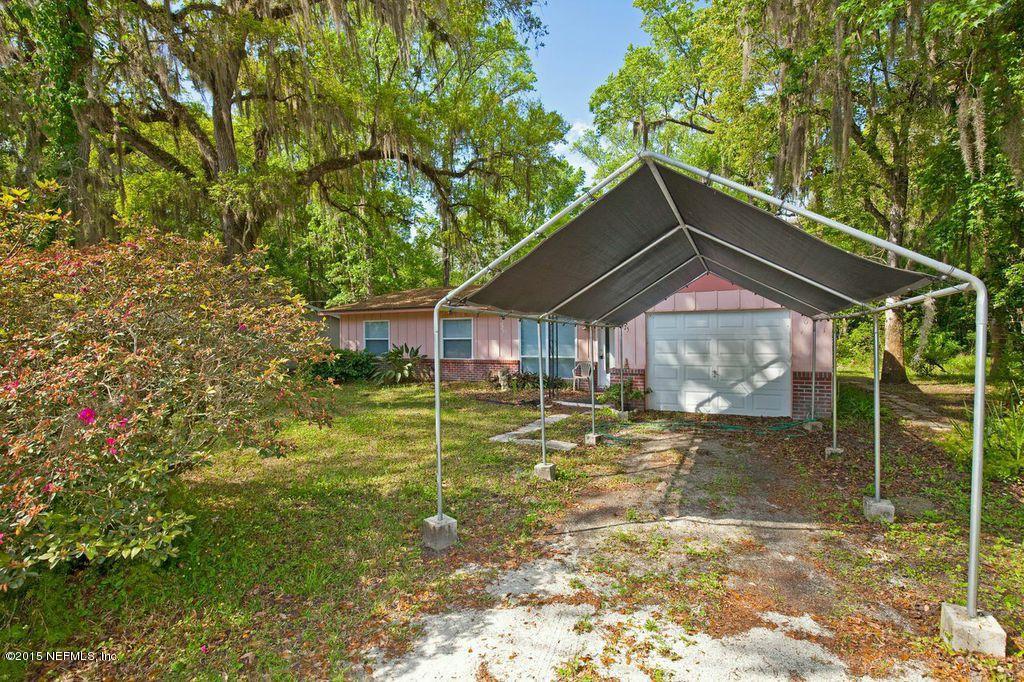 1975 Deer Run Road St. Augustine, FL 32084 - Photo 9 of 35 a front view of house with yard