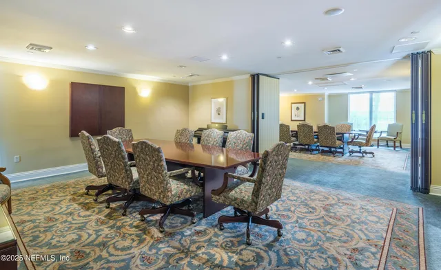 a view of a dining room with furniture
