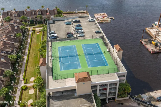 a aerial view of a house with a yard