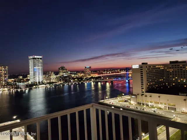 a view of swimming pool with outdoor seating