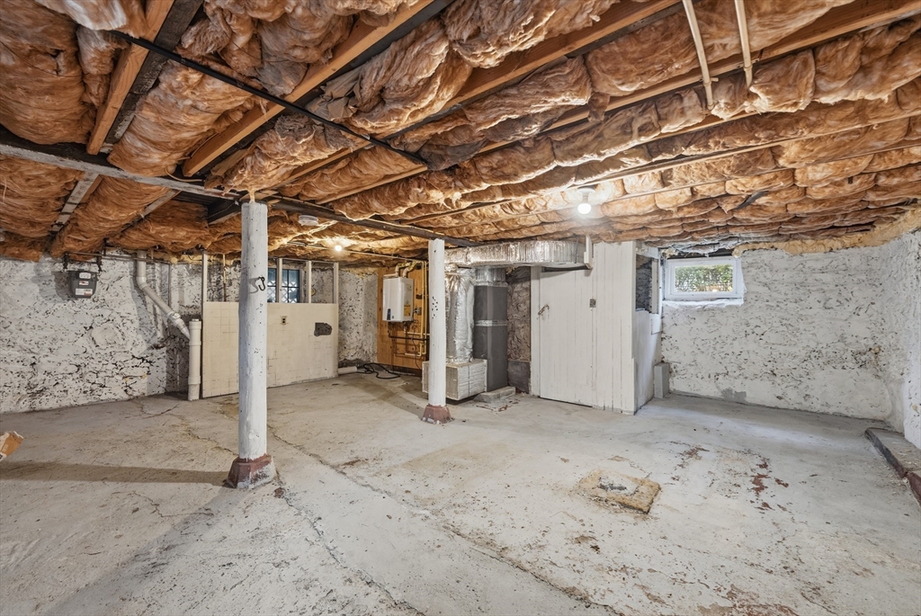 31 Chipman Street Boston, MA 02124 - Photo 27 of 37 a view of a room with wooden walls