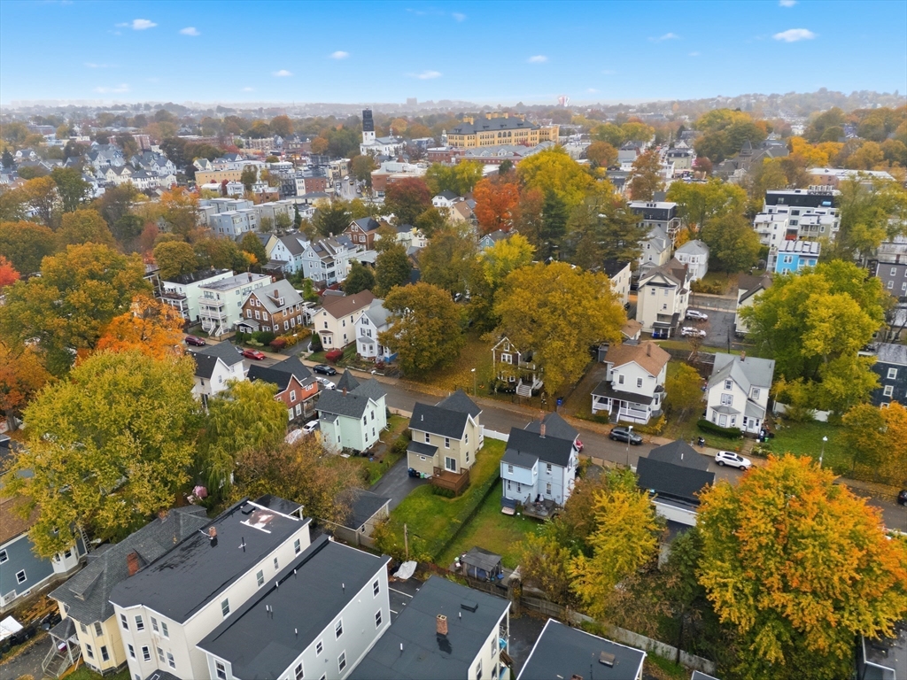 31 Chipman Street Boston, MA 02124 - Photo 34 of 37 an aerial view of residential building with parking
