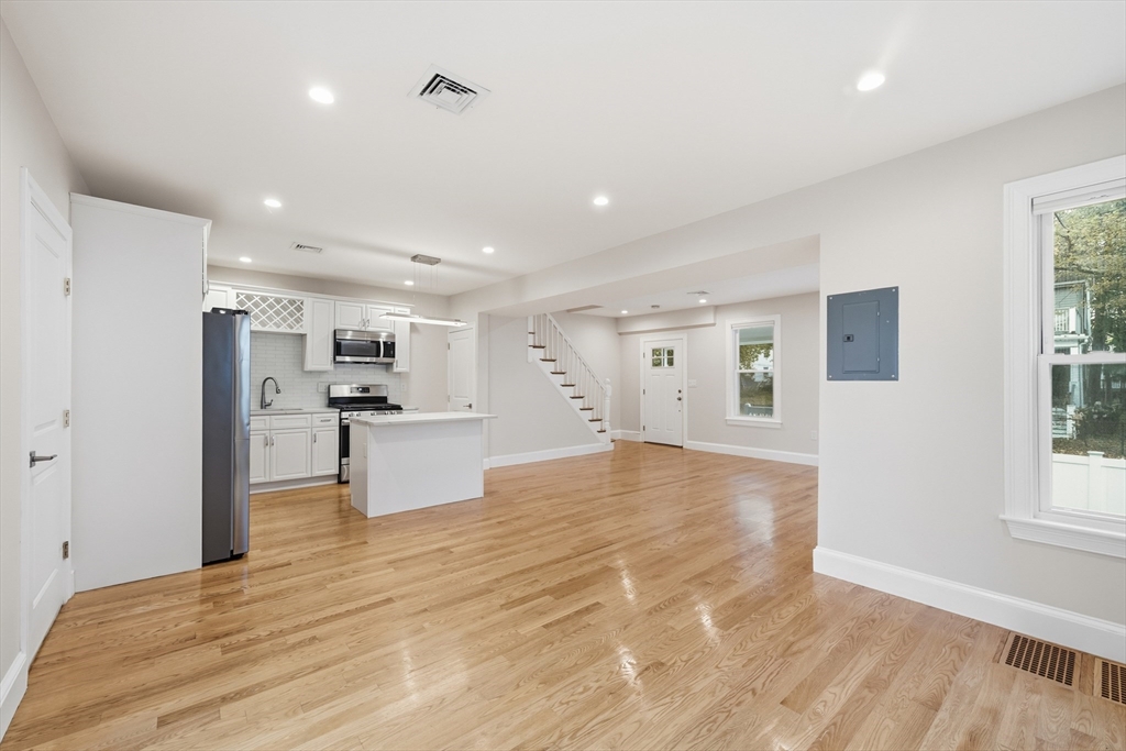 31 Chipman Street Boston, MA 02124 - Photo 10 of 37 a view of kitchen with wooden floor