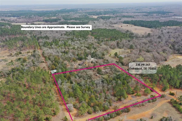 a view of house with outdoor space and sitting area