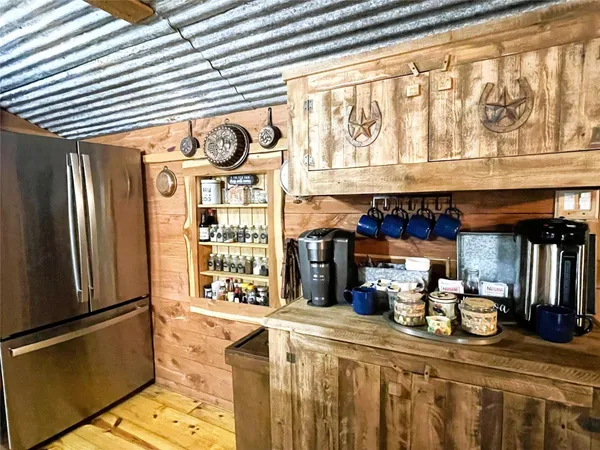 a kitchen with a sink cabinets and window