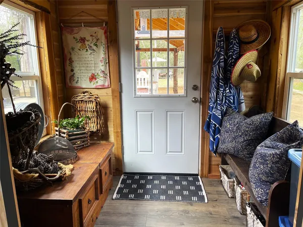 a view of a patio with chairs and tables