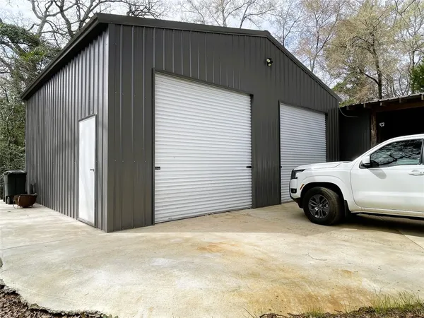 a blue house with a outdoor space