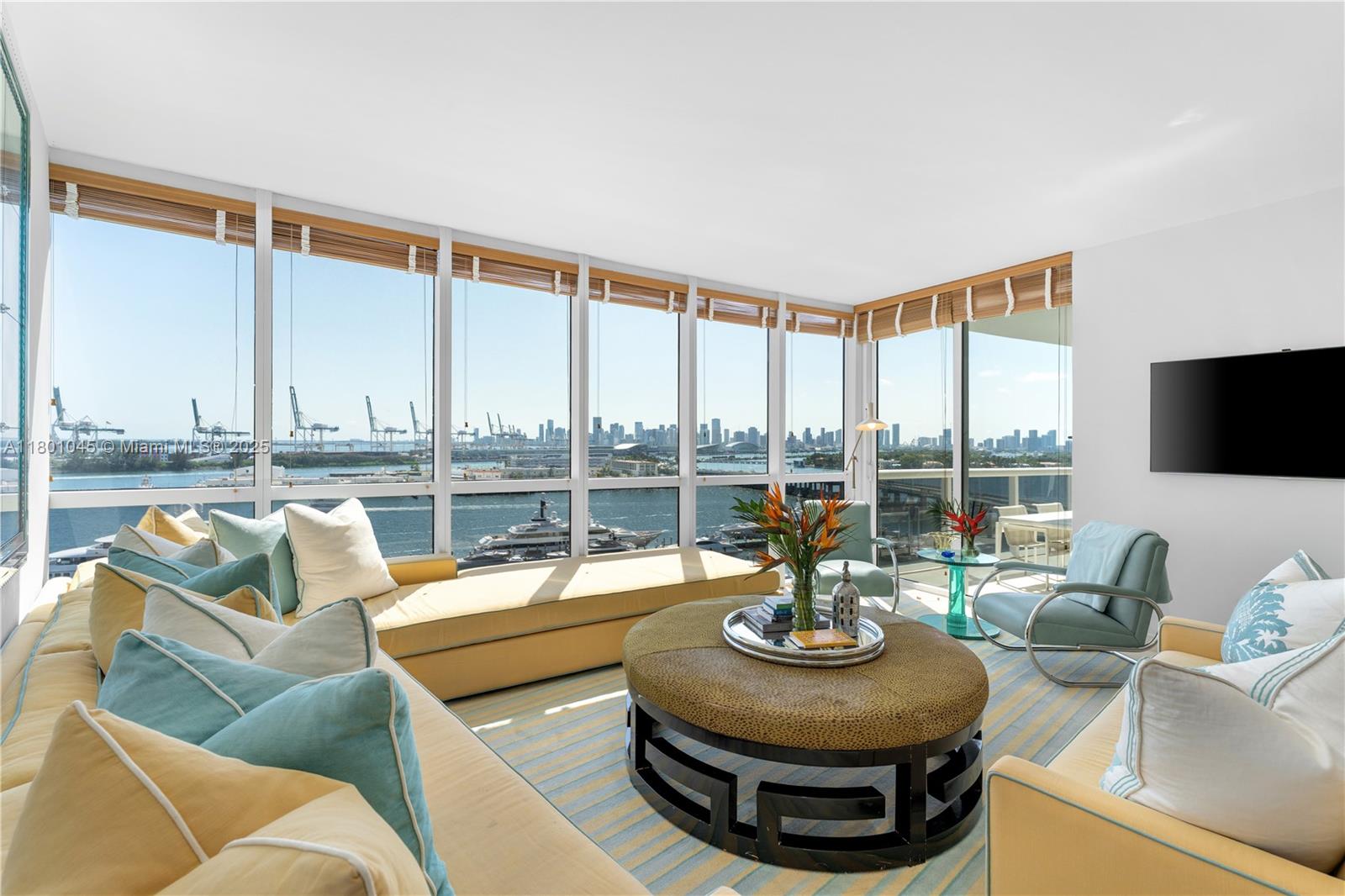 400 Alton Road, Unit 1101 Miami Beach, FL 33139 - Photo 14 of 31 a living room with furniture and a large window