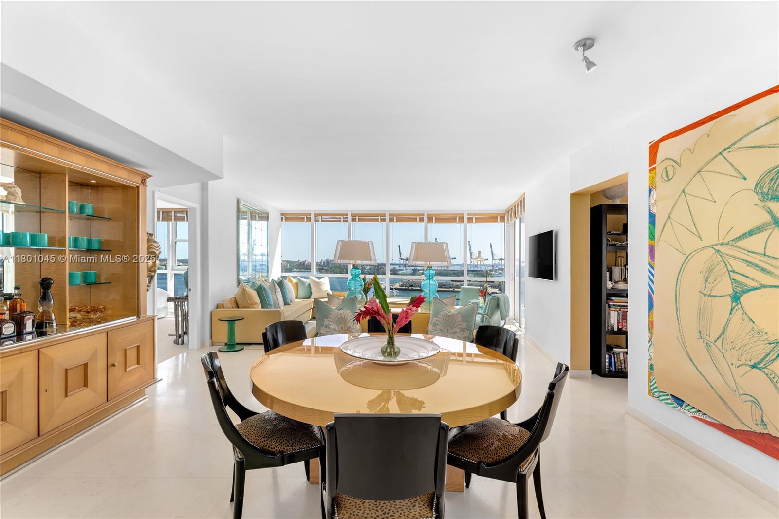 400 Alton Road, Unit 1101 Miami Beach, FL 33139 - Photo 16 of 31 a view of a dining room with furniture window and outside view