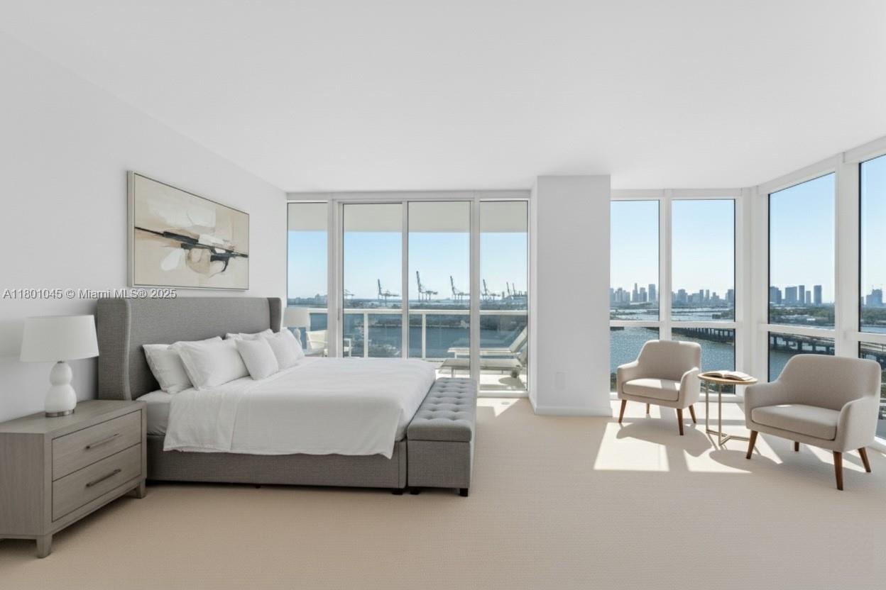 400 Alton Road, Unit 1101 Miami Beach, FL 33139 - Photo 4 of 31 a spacious bedroom with a bed and large windows