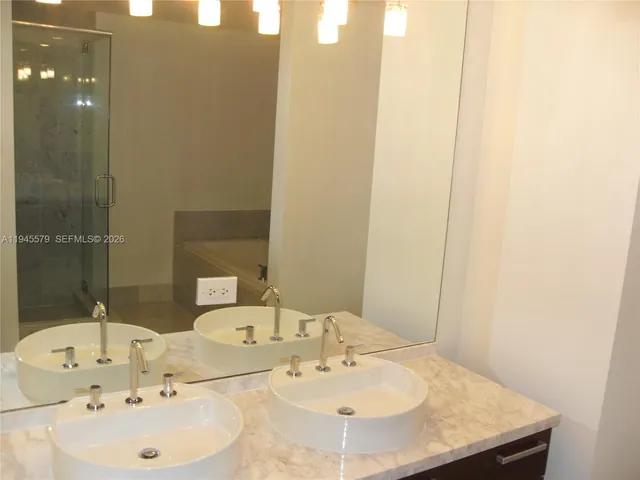 a kitchen with a cabinets and a fireplace