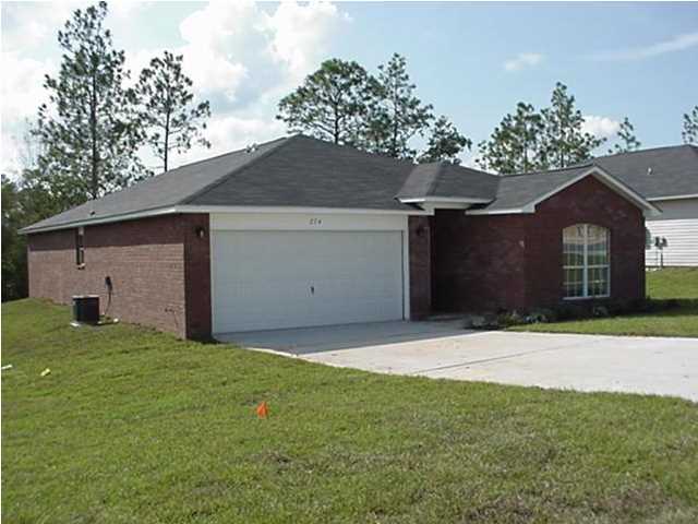 a front view of house with yard
