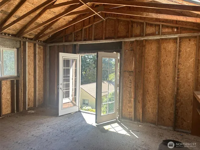 a view of a room with a large window