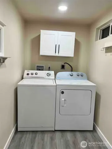 a utility room with dryer and washer