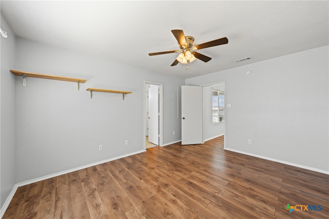 305 James Loop Killeen, TX 76542 - Photo 20 of 32 a view of empty room with wooden floor