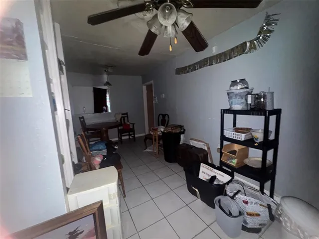 a room with furniture and wooden floor