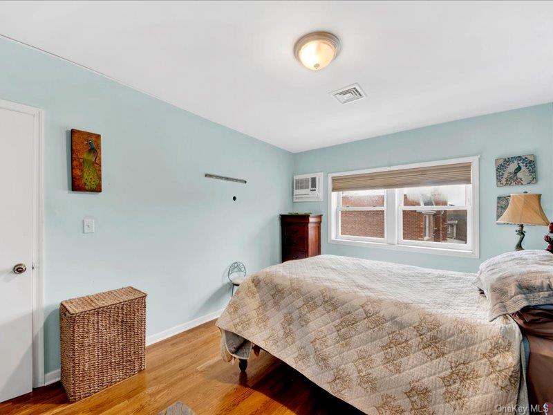 2576 Harding Avenue Bronx, NY 10465 - Photo 15 of 26 a bedroom with a bed and a window