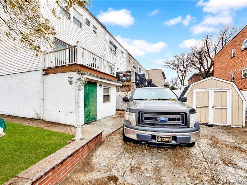 2576 Harding Avenue Bronx, NY 10465 - Photo 22 of 26 a view of a house with a yard