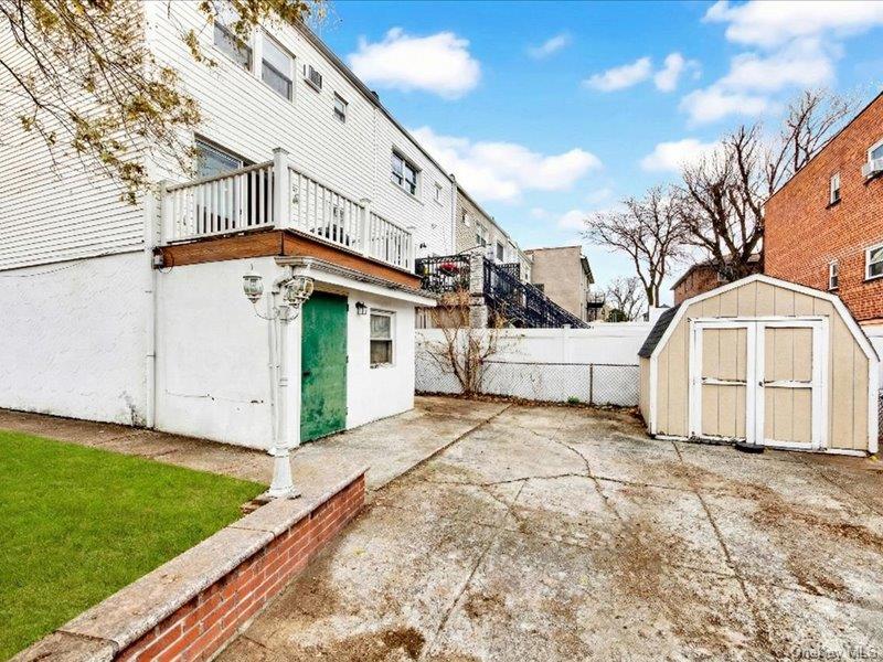 2576 Harding Avenue Bronx, NY 10465 - Photo 23 of 26 a view of a house with a yard